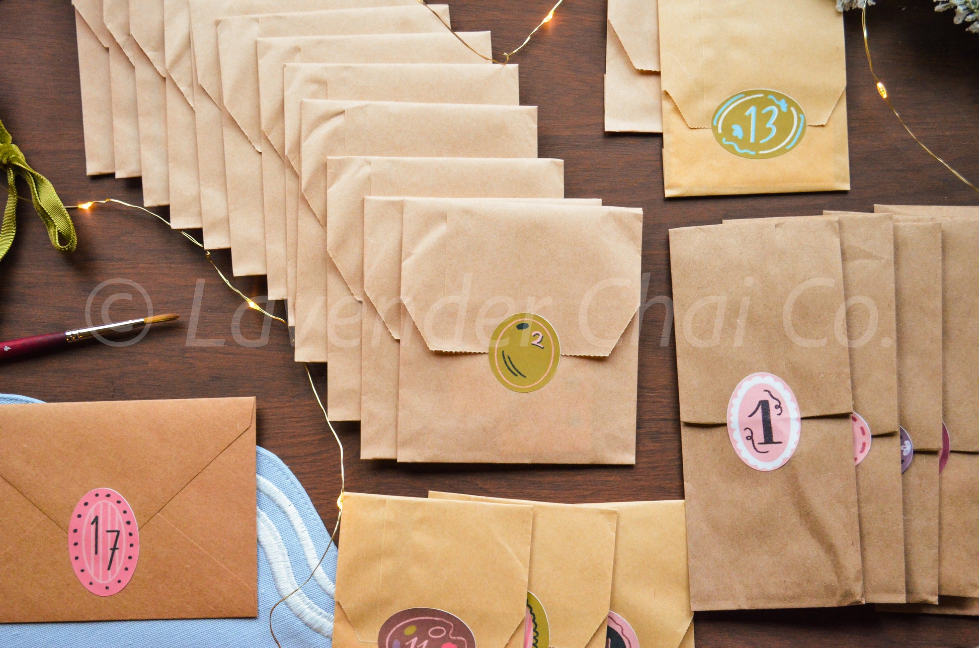 Brown paper bags with numbers on a wooden surface
