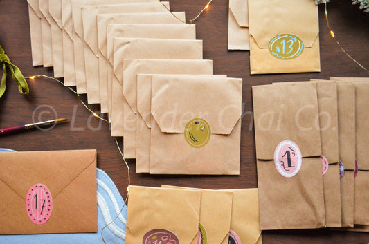 Brown paper bags with numbers on a wooden surface